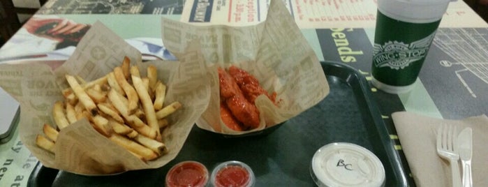 Wingstop is one of Places I must try.