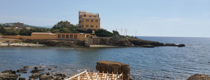 Riservato Beach Bar is one of Alghero.