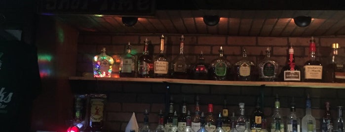 O'Shucks Pub & Karaoke Bar is one of Bars.
