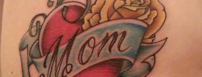 Mom And Pop Tattoo is one of Places.