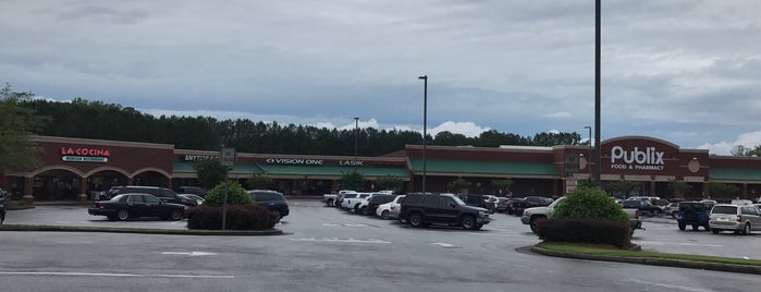 Brookstone Village Shopping Center is one of Tempat yang Disukai John.