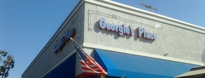 Georgie's Place is one of สถานที่ที่ Ryan ถูกใจ.