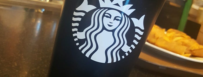 Starbucks is one of สถานที่ที่ Norah ถูกใจ.