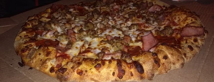 domino's pizza is one of Locais curtidos por Andrea🎈.