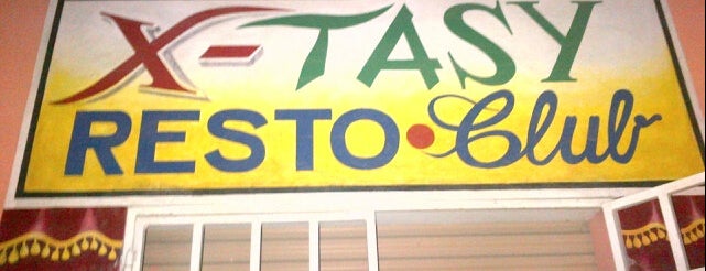 X-tassy Resto club is one of Ayiti.