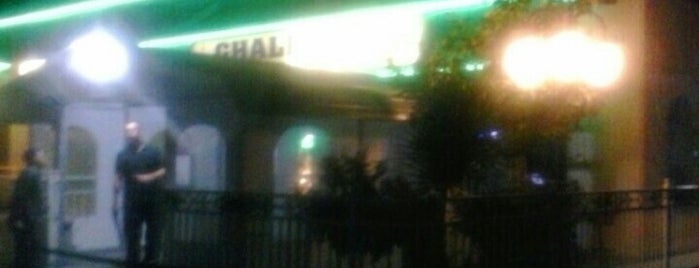 Ghaleb's Grill and Hookah Lounge is one of Lieux qui ont plu à Trevor.