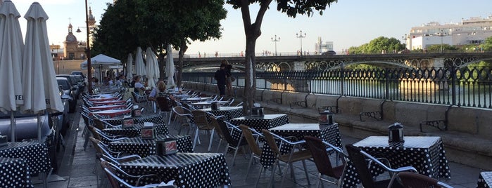 Puente de Isabel II 'Puente de Triana' is one of Tempat yang Disukai Kelly Marcelino.