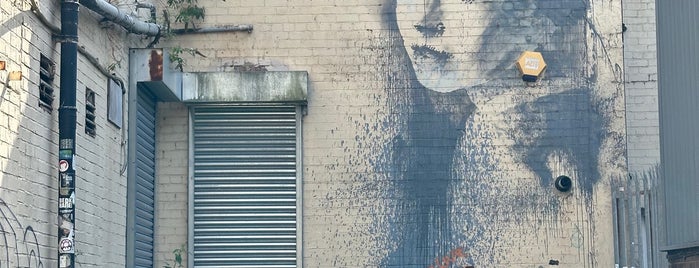Banksy's "Girl with the Pierced Eardrum" is one of Mael’s Liked Places.