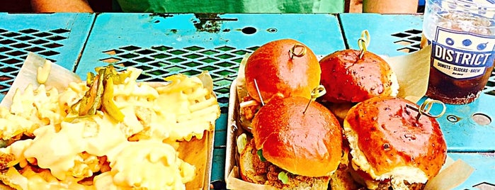 DISTRICT. Donuts. Sliders. Brew. is one of NOLA.