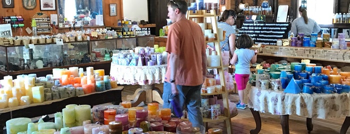 Seven Sisters Soap & Candle Co. - Konrad's Garage is one of Ryan’s Liked Places.