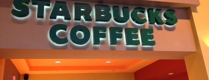 Starbucks is one of สถานที่ที่ E ถูกใจ.