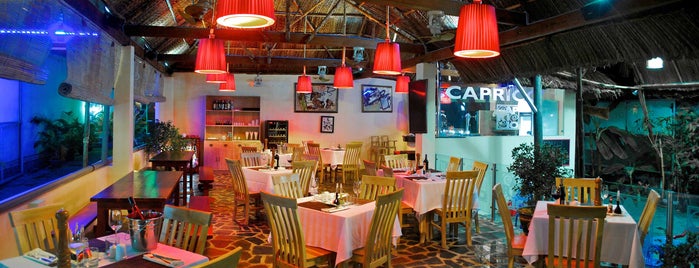 Capriccio Italian Restaurant & Pizzeria is one of Muine.