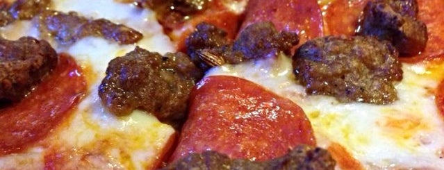 Merrell's Pizza is one of G. Village.