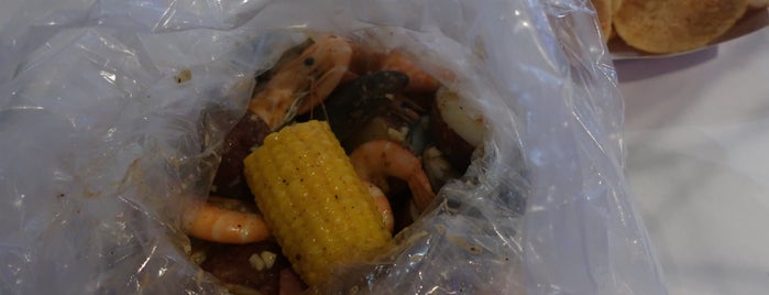 Cajun Boiled Seafood CT is one of Lugares favoritos de John.