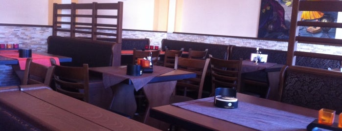 Restaurant Athos is one of Tempat yang Disukai Martina.