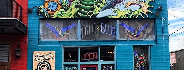 True Blue Tattoo is one of สถานที่ที่ Josh ถูกใจ.