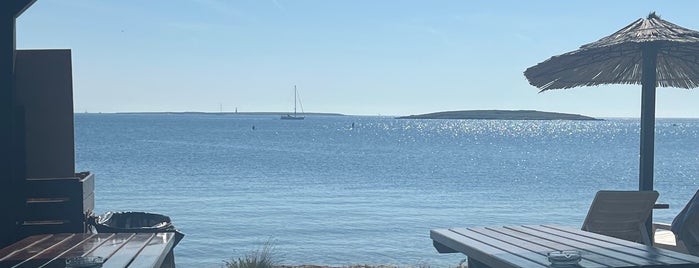 Beach Bar Školjić is one of Istria.