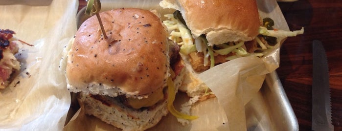 DISTRICT. Donuts. Sliders. Brew. is one of new orleans coffee.