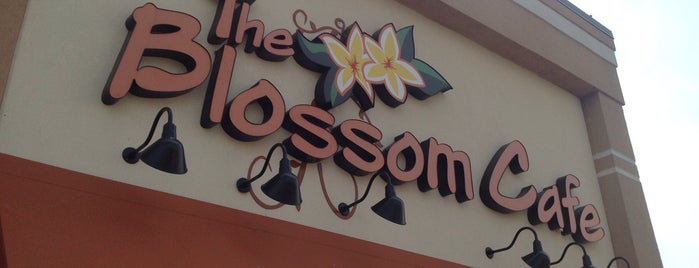 The Blossom Cafe is one of Places.