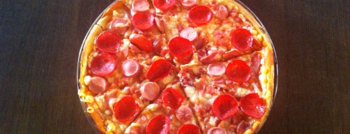Juliu's Pizza is one of Posti che sono piaciuti a Beno.