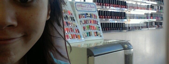 Laura's Nail Salon is one of Shopping & Beauty.