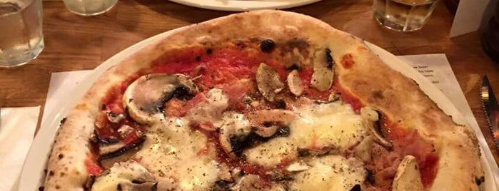 Paesano Pizza is one of Lugares favoritos de Ryan.