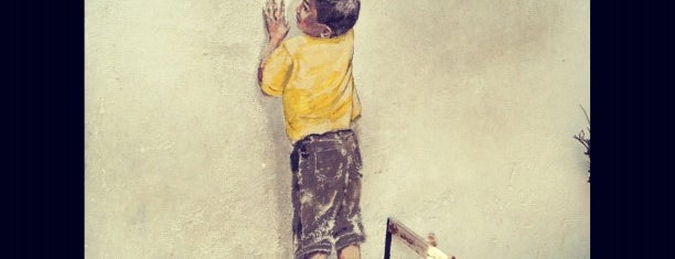 Penang Street Art : Boy on Chair is one of Penang Street Art.