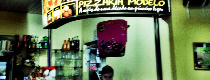 Pizzaria Modelo is one of Locais.