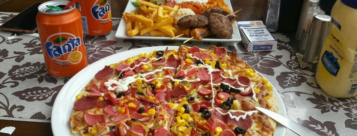 Takıles Pizza is one of Posti che sono piaciuti a Aylin.