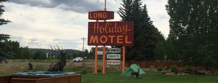 Long Holiday Motel is one of Lieux qui ont plu à Zach.