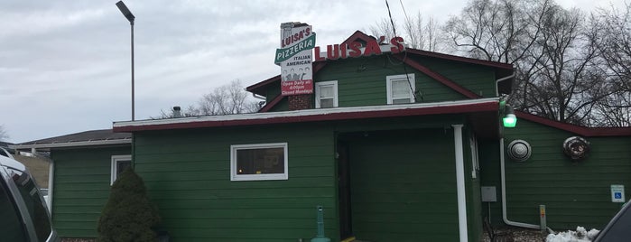 Luisa's Pizza is one of Places to go.