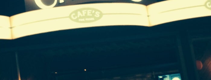 Cafe's Fine Foods is one of Lugares favoritos de 103372.