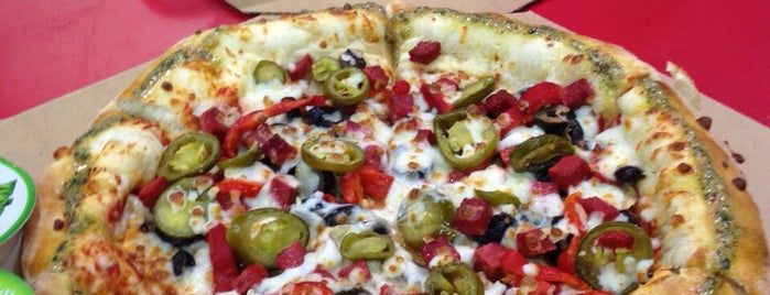 Domino's Pizza is one of Tempat yang Disukai Ahmed Said.