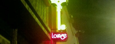 Next Door Lounge is one of Bars.