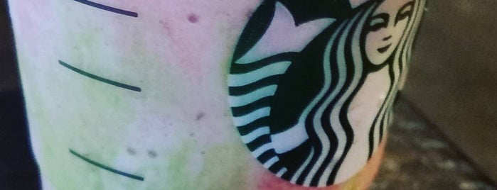 Starbucks is one of Locais curtidos por Lily.