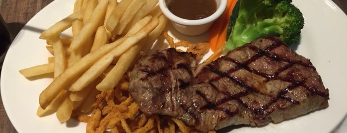Black Angus Steakhouse is one of Locais curtidos por Wess.
