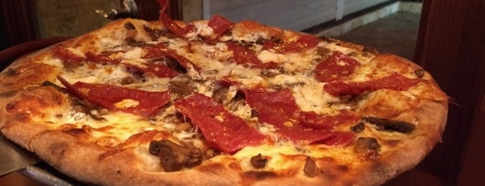 Luigi's Coal Oven Pizza is one of Norah’s Liked Places.