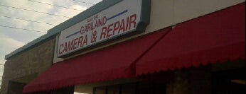 Garland Camera & Repair Shop is one of Signage.