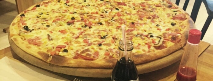 Happy's Pizza is one of Orte, die Belen gefallen.