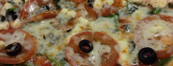 Sapore's Pizza is one of สถานที่ที่บันทึกไว้ของ Kim.