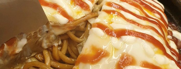 Fugetsu Okonomiyaki is one of สถานที่ที่ Yarn ถูกใจ.