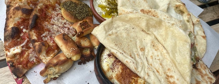 Ta’mini Lebanese Bakery is one of Jiordana 님이 저장한 장소.