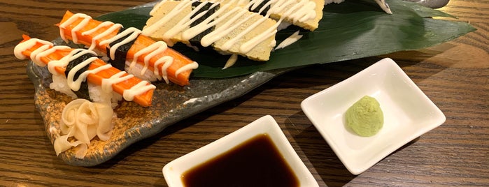 Sushi Den is one of BKK.