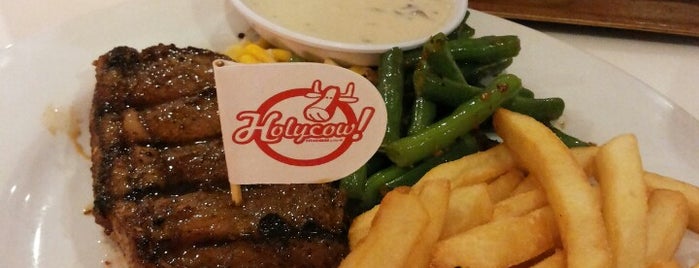 Hollycow Steak - Monginsidi is one of Tempat yang Disukai Andre.