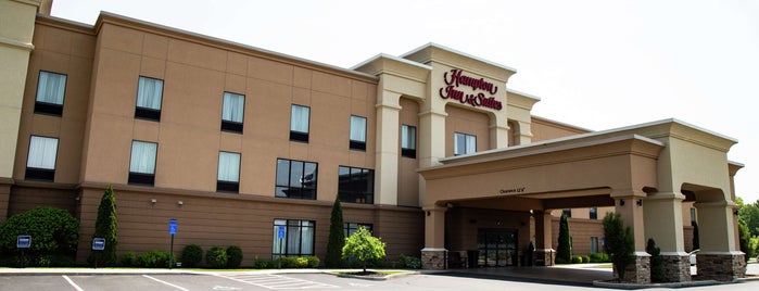 Hampton Inn & Suites is one of Hotels I've checked in at.