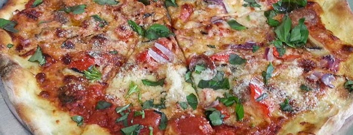 Di Fara Pizza is one of 21 Things You Must Eat in NYC Before You Die.