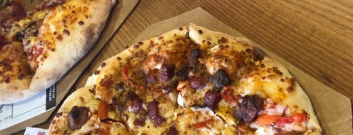 Domino's Pizza is one of Lieux sauvegardés par Mustafa.