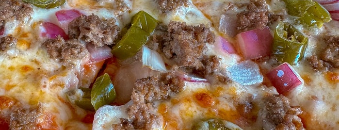 Mi Familias Pizza at the Lazy Parrot is one of Puerto Rico.