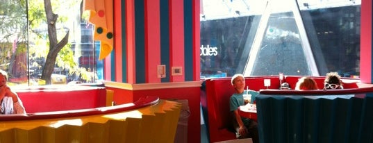 Dylan's Candy Bar is one of Places with Booths (for sitting purposes).