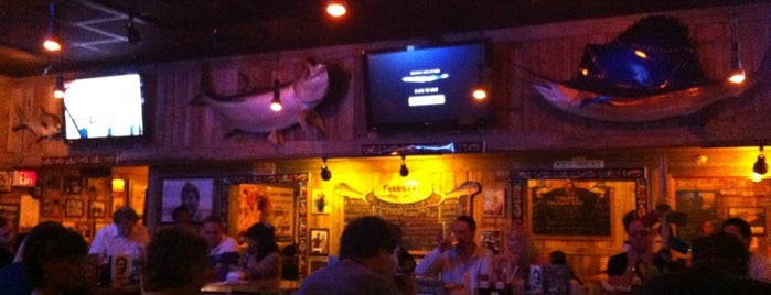 Flanigan's Seafood Bar & Grill is one of Tempat yang Disukai Lori.